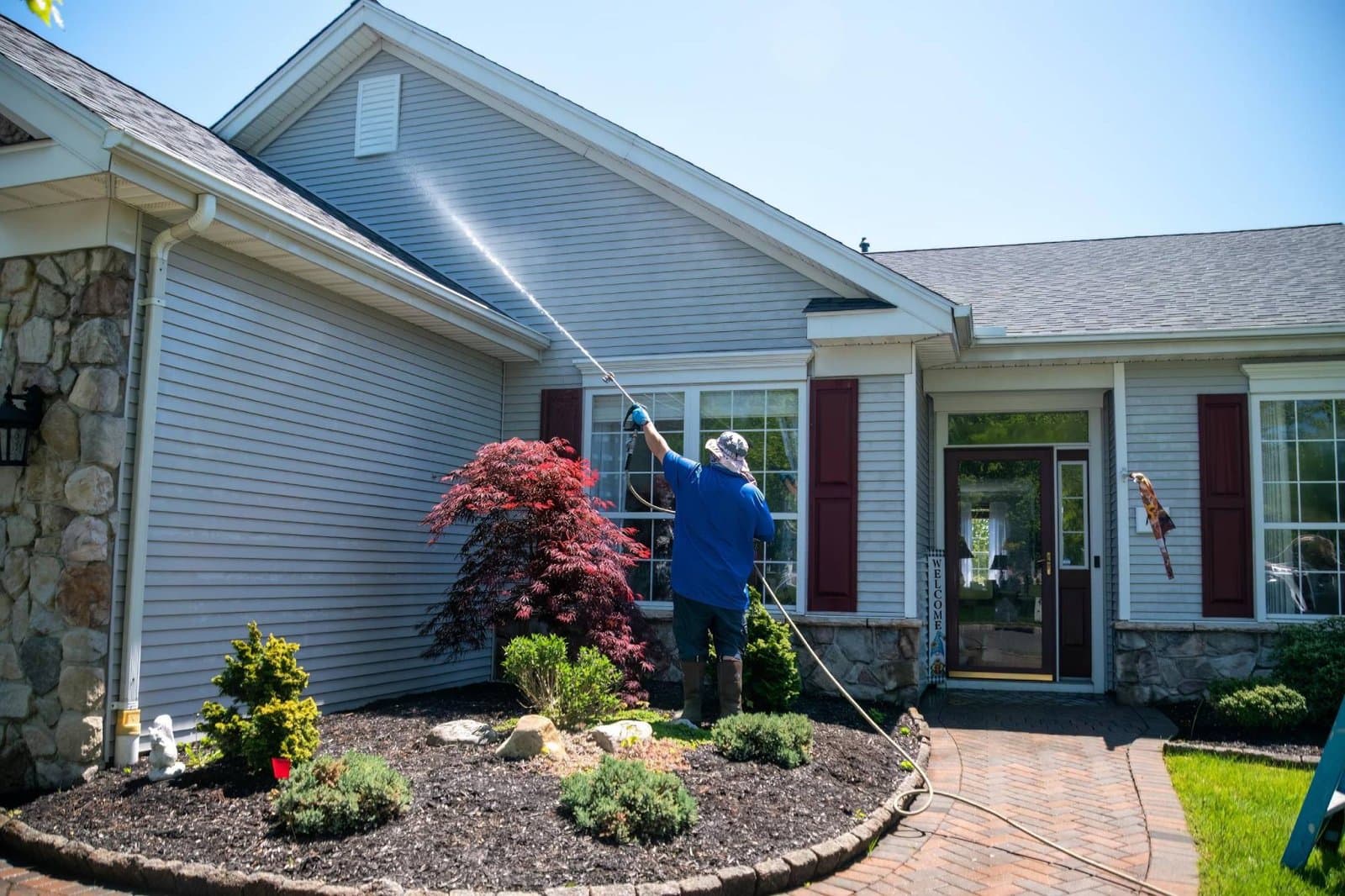 Pressure washing a residential driveway